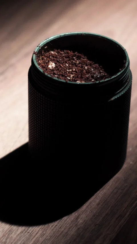 Coffee Grinder Container Grounds Reveal Dark 4K Stock Footage 325389637