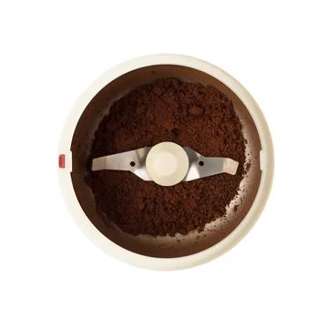 Coffee grinder with ground beans 스톡 사진