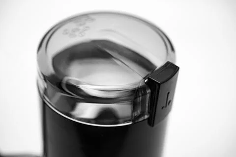 Coffee grinder lid with transparent opening mechanism on top Stock Photos