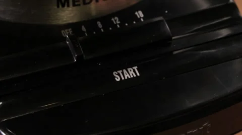 Coffee Grinder Switch - Turns On - Two Takes Stock Footage 61405710