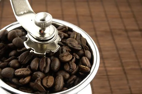 Coffee grinder on the table. Stock Photos