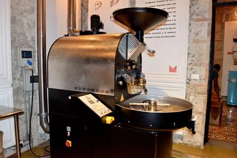 A coffee grinder with a timer and a screen Stock Photos