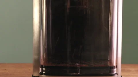 Coffee Grinder Turns On - Coffee Grounds Come Out Stock Footage 61405802