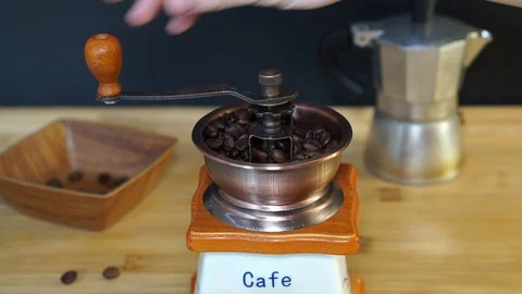 Coffee grinding process in a coffee grinder Stock Footage 104719089