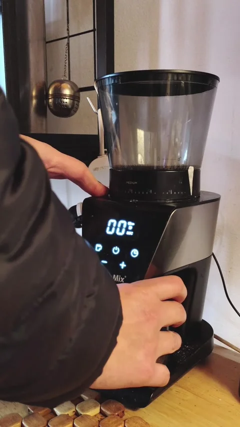Coffee grinding process in kitchen Stock Footage 342274369