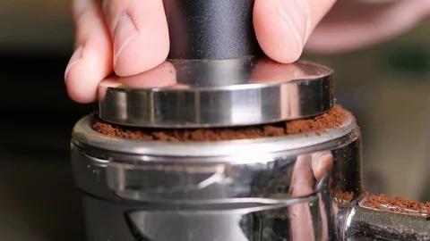 Coffee grounds being pressed down close up 4K Stock-Footage 93380869