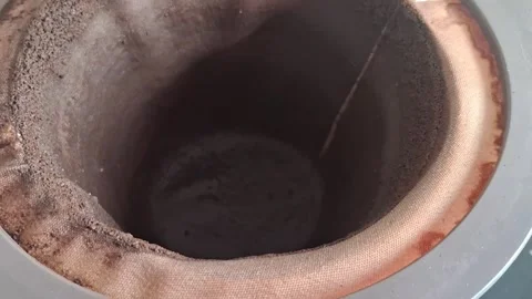Coffee grounds brewing inside a mesh filter animation video clip Stock Footage 339247348