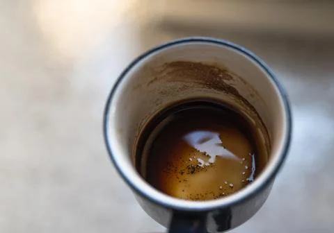Coffee grounds on the cup Stock Photos