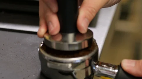 Coffee grounds in sump being pressed close up 스톡 동영상 93380910