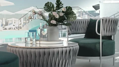 Coffee group consisting of a table with granite table top and comfortable chairs Stock Footage 220772278