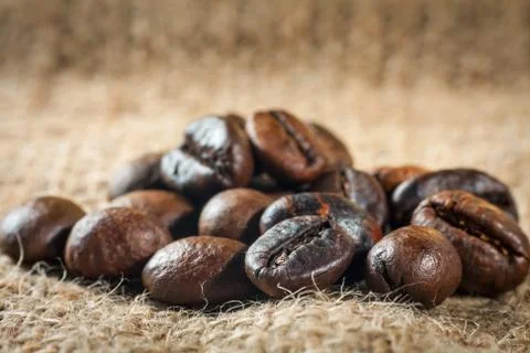 Coffee on grunge burlap background Stock Photos