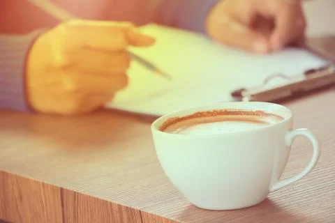 Coffee with hand writing Stock Photos