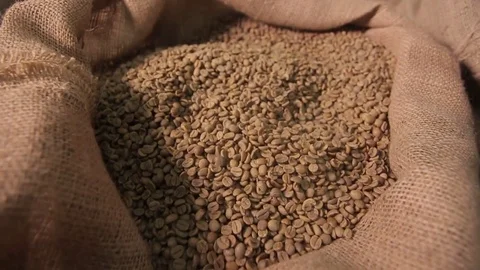 Coffee hands in a bag, roasted coffee Stock Footage 76268239