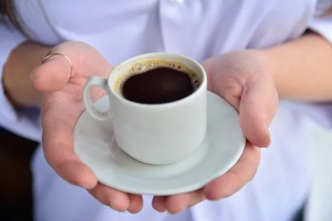 Coffee in hands woman Stock Photos