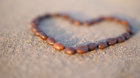 Coffee heart in the rays of sunset Stock Footage 86321120