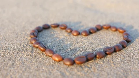 Coffee heart in the rays of sunset Stock Footage 86321215