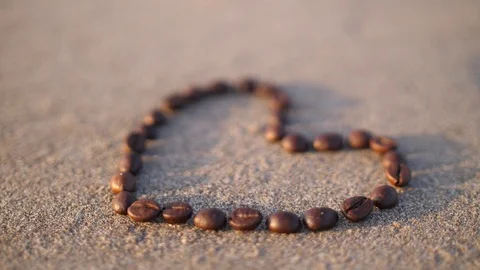 Coffee heart in the rays of sunset Stock Footage 86324070