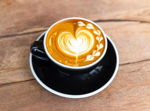 Coffee with heart shape on it Stock Photos