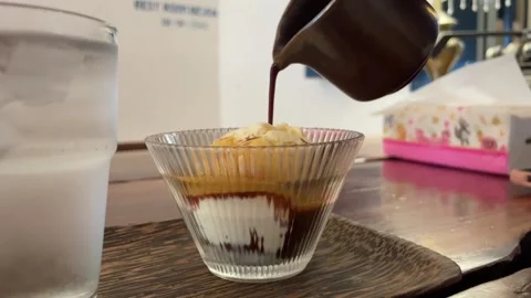 Coffee on ice cream Stock Footage 246570616
