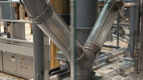 Coffee inside transparent v-shape container Stock Footage 119256480