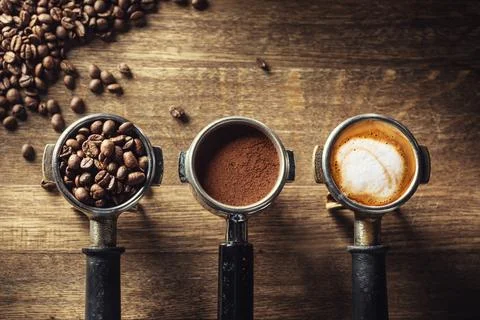 Coffee in its various forms from raw beans to ground coffee and cappuccino .. 스톡 사진