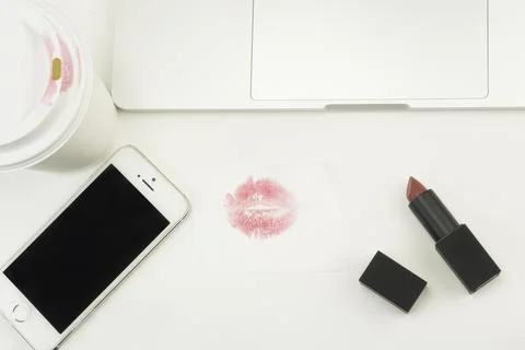 Coffee  laptop computer, notebook and eye glasses,lipsticlk,iphone Stock Photos