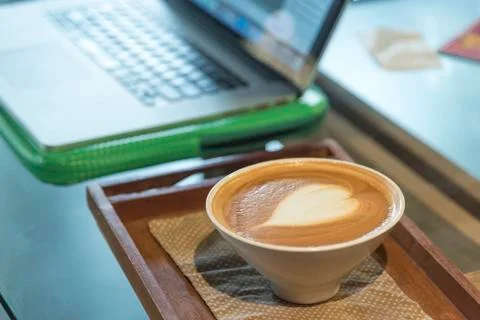 Coffee latte with notebook Stock Photos