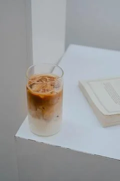 Coffee latte in white table Stock Photos