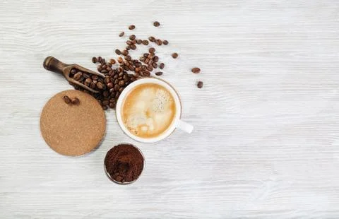 Coffee on light wood table Stock Photos