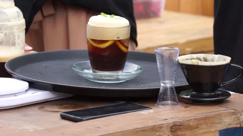 Coffee with liquid on the table Stock Footage 246068648