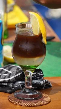 Coffee with liquid on the table 스톡 사진