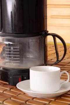 Coffee machine and cup Stock Photos
