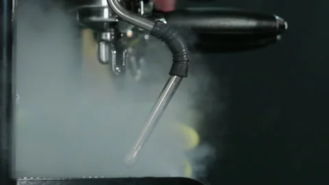 Coffee machine cleans grate for placing cups with steam Stock Footage 306586993