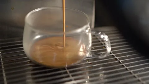 Coffee machine compress the coffee bean to brew coffee Stock Footage 289527991