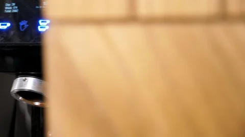 Coffee machine crushes coffee beans Stock Footage 96034824