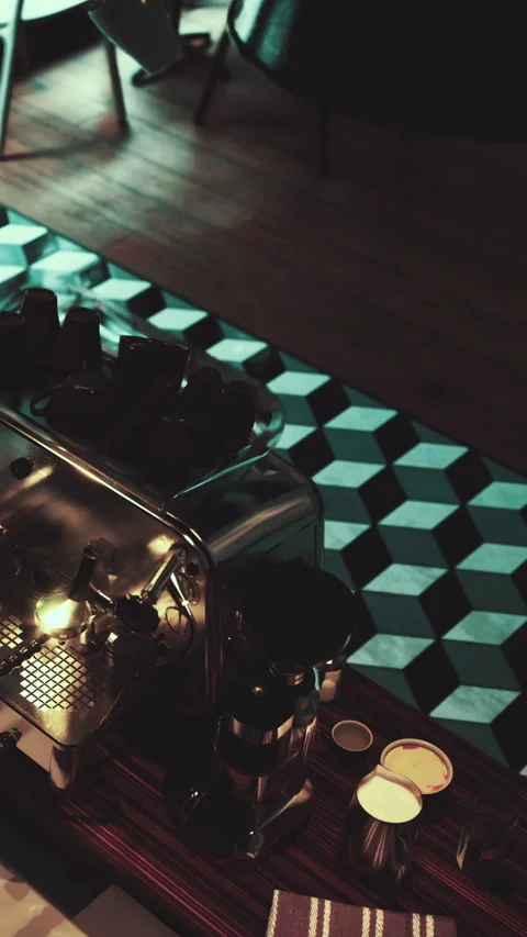 Coffee machine with cups on geometric floor in a modern cafe setup Stock Footage 338349734