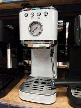 Coffee machine of Elit brand standing in household technology market on she.. Stock Photos