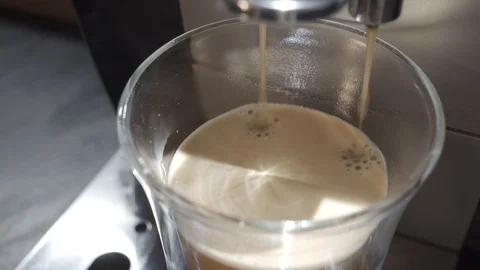 Coffee machine ends cooking cappuccino Stock Footage 101615214