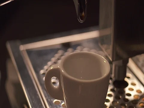 Coffee machine filling a cup with hot fresh coffee Stock Footage 73683308