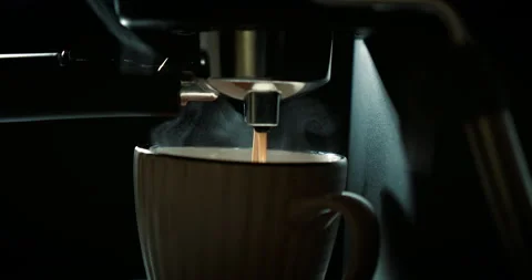 Coffee machine filling a cup with. Making coffee by coffee machine into cup Stock Footage 172446278