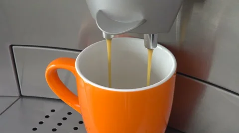 Coffee machine fills mug with coffee Stock Footage 67609899