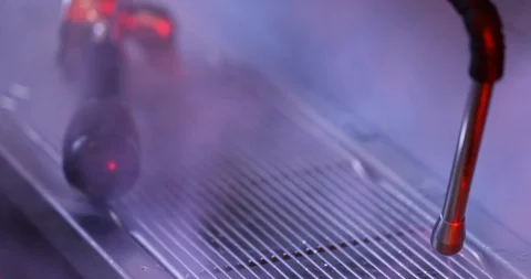 Coffee machine filter holder and steam wand closeup. Creating coffee. Video stock 122371813