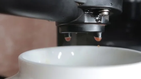 Coffee machine. Fresh aromatic invigorating drink. Close-up of dripping coffee 動画素材 126921015