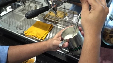 Coffee machine is frothing milk Stock Footage 252124619