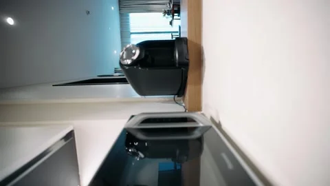  coffee machine on the kitchen table and microwave Stock Footage 267244230