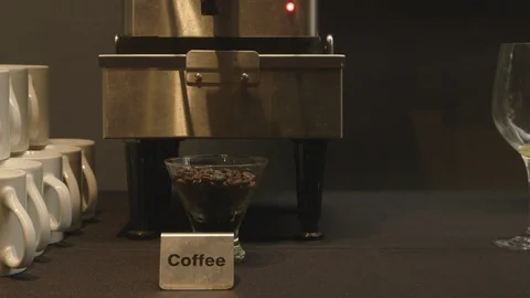 Coffee Machine with Label Next to Coffee Mugs Stock Footage 115861687