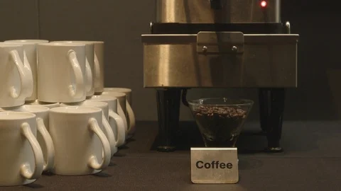 Coffee Machine with Label Next to Coffee Mugs Stock Footage 115861729
