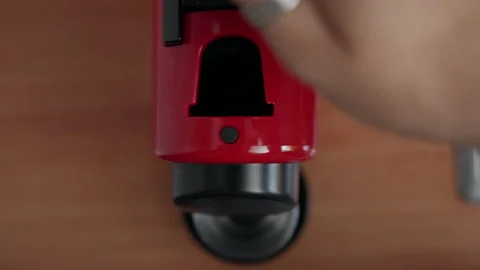 Coffee machine lid is opened an capsule placed inside, Top down 스톡 동영상 307710756