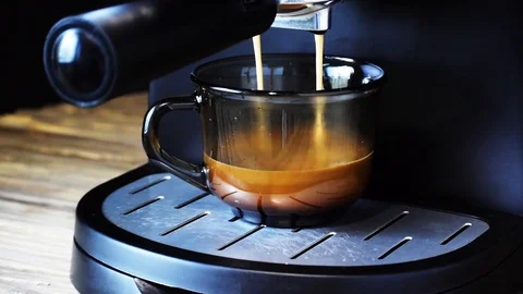 Coffee machine makes black coffee with high foam Stock Footage