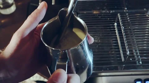 Coffee machine makes cappuccino foam Stock Footage 200204130